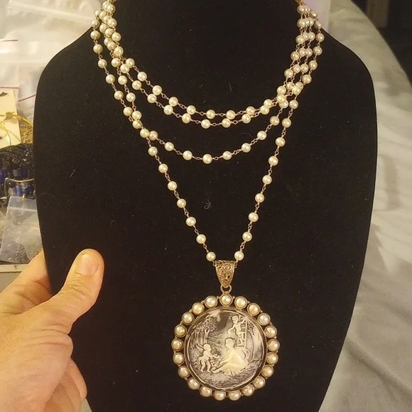 SaFia Signed Longer Pearl Necklace with Silver Cameo Pendant.